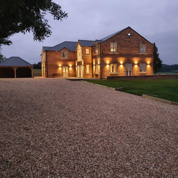 Driveway Gravel driveway grid with stones in for gravel stabilisation