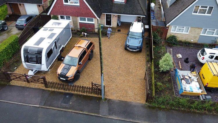 Install gravel grids as a low cost gravel driveway surface for caravans and SUVs