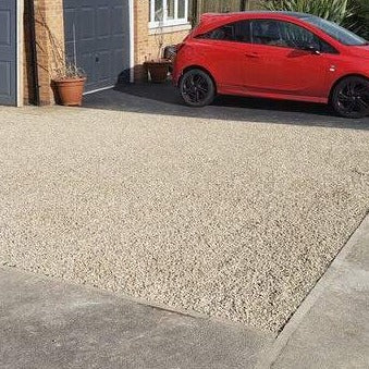Customer driveway installed with gravel parking grids