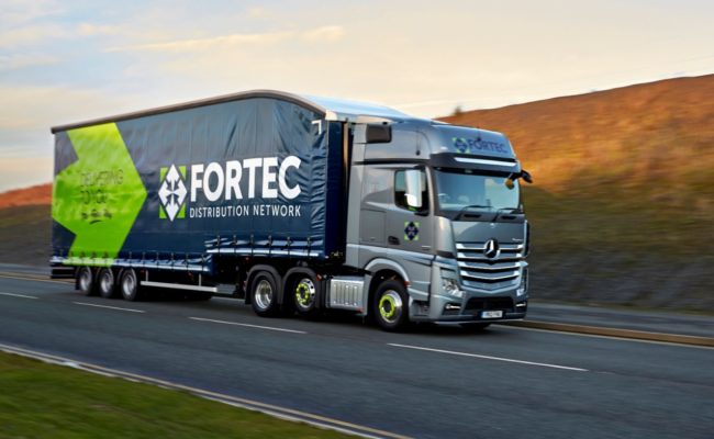 Pallet distribution of gravel parking grids via Fortec