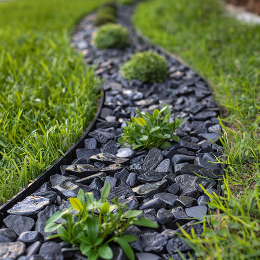 Grass lawn edging separating turf from stones