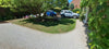 Driveway with stones held by honeycomb gravel grids