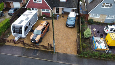 Install gravel grids as a low cost gravel driveway surface